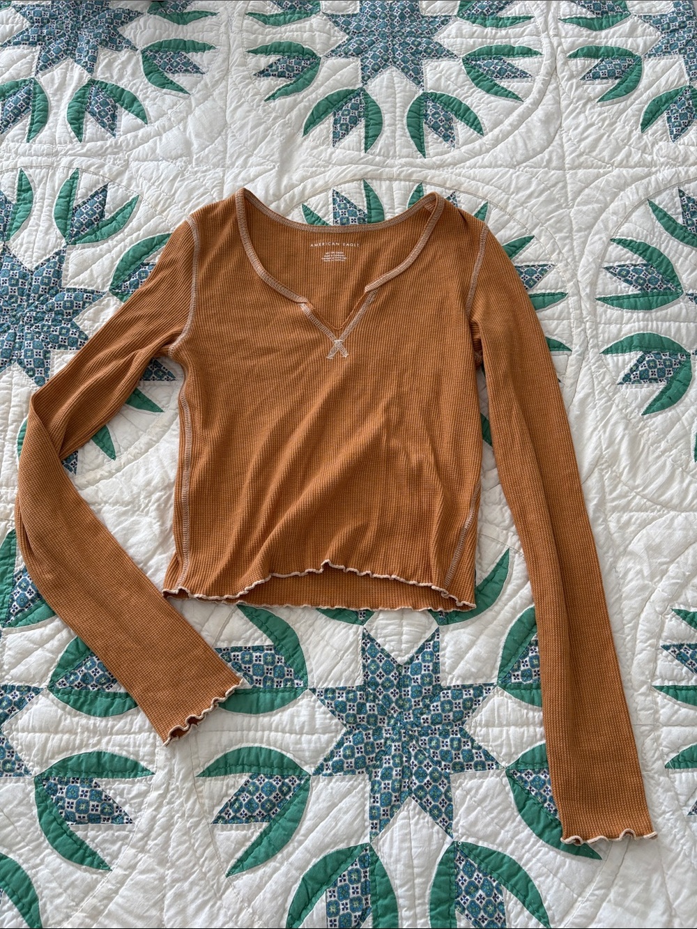 American Eagle Outfitters mustard yellow Ribbed Lettuce-Hem Long Sleeve Top